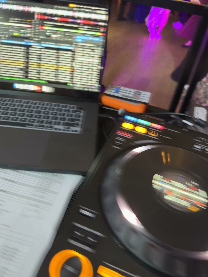 DJ KYD preparing bilingual and multicultural wedding music in Massachusetts